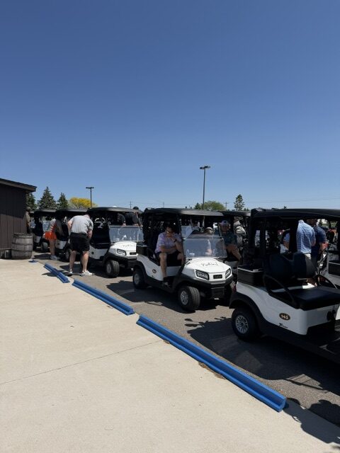 Golfers lined up in Northbrook's new carts, ready to go!